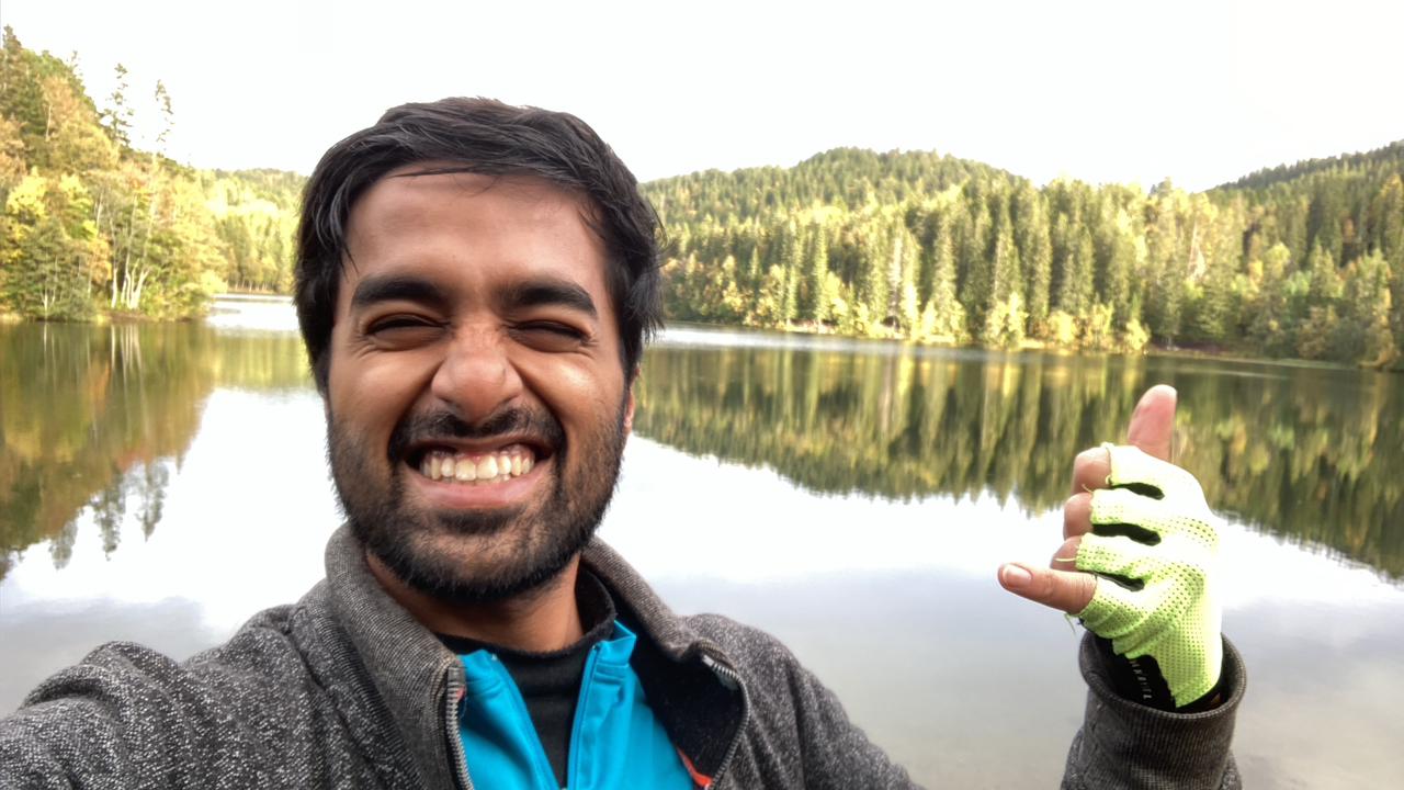 A person sitting at a desk in front of a computer